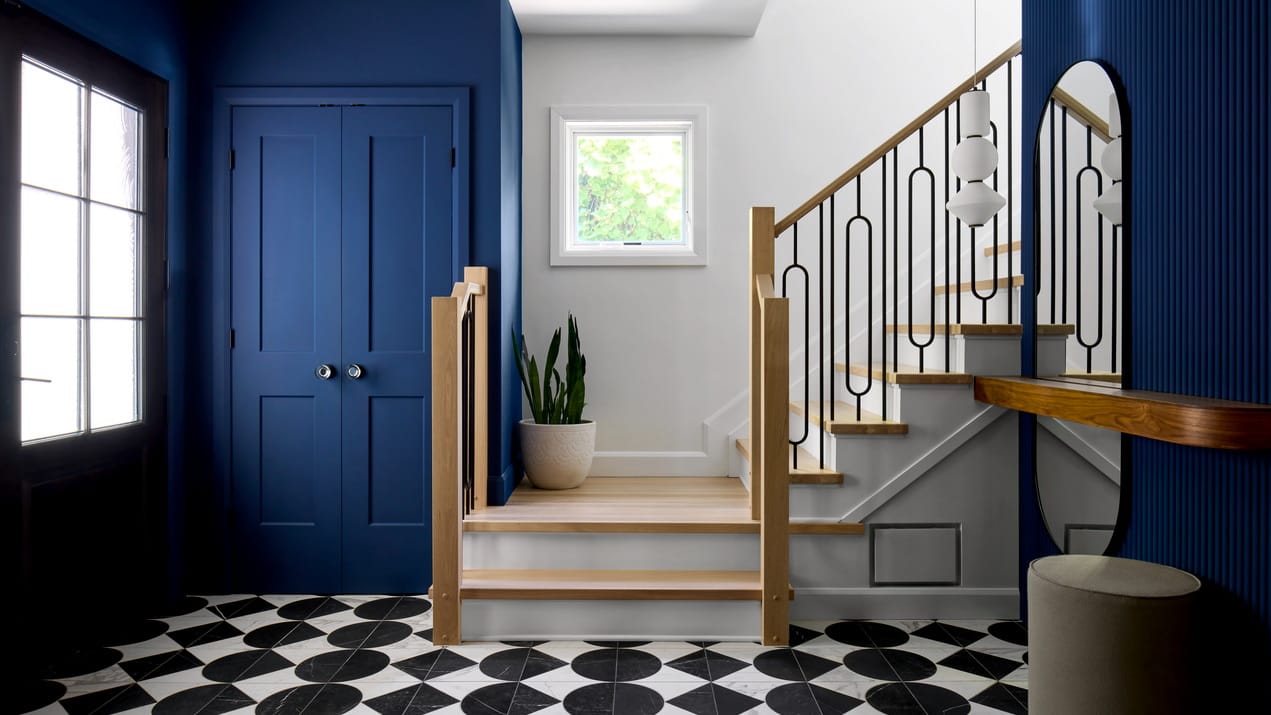 2026 One of One awards Ottawa interior design foyer entryway dark blue checkerboard tile Bytown Designs