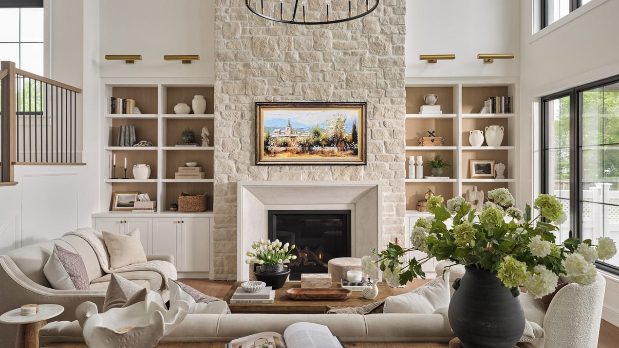 2026 One of One awards Ottawa interior design living room fireplace stone neutrals Eastboro Designs