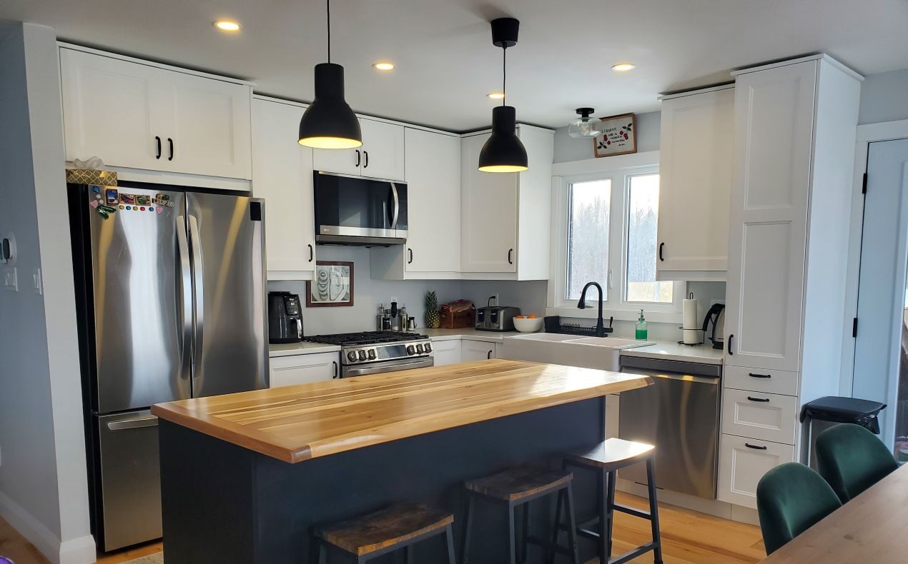 Photo of kitchen in home built by College la Cite students.