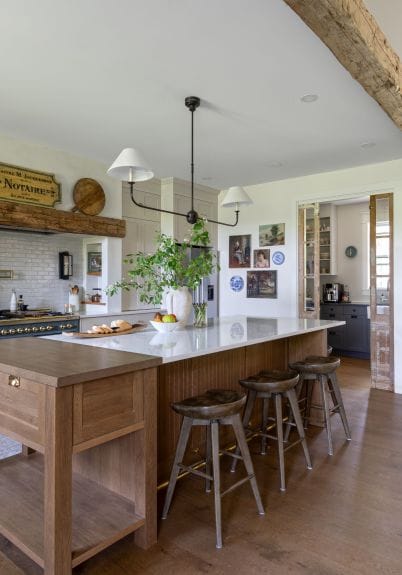Photo of the island in the custom home kitchen by Sonya Kinkade Design.