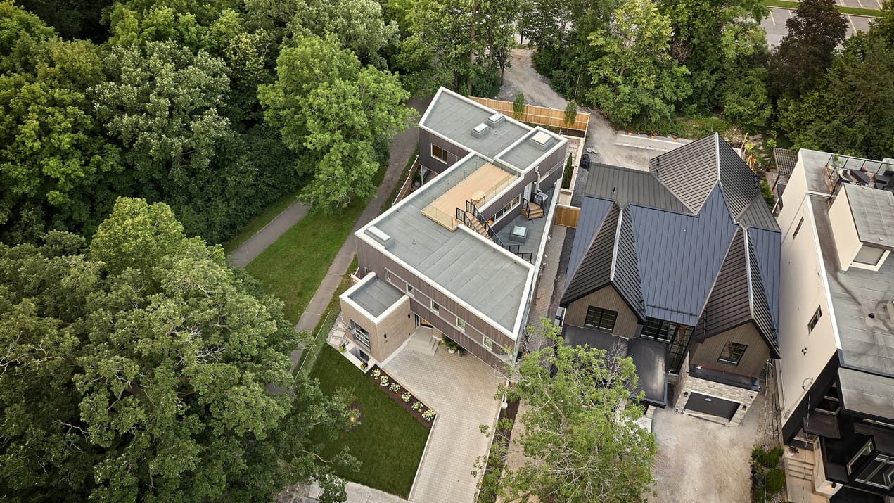 aerial view of a zed-shaped home by Linebox Studio and Sanchez Homes