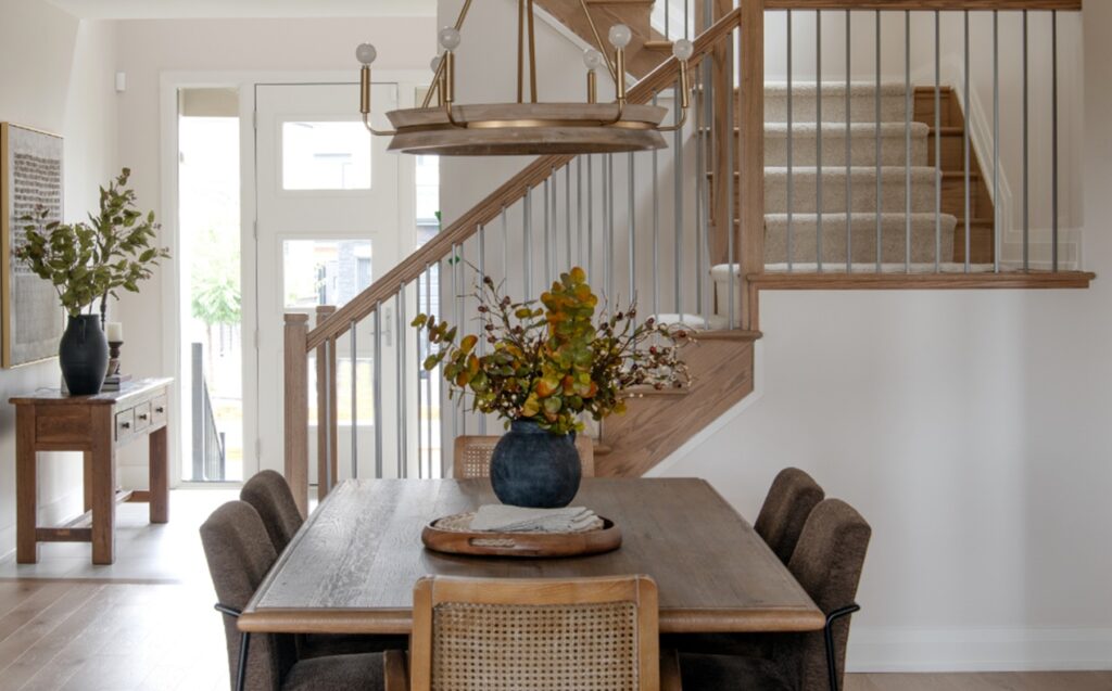 Photo of the oak-and-stainless-steel spindles in The Juno single-family model home by Minto in Mahogany.