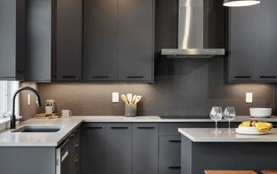 Photo of undercabinet lighting, which Potvin Construction says is an essential kitchen accessory.