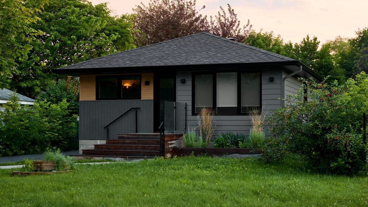 exterior of a small bungalow that’s been renovated by The Conscious Builder