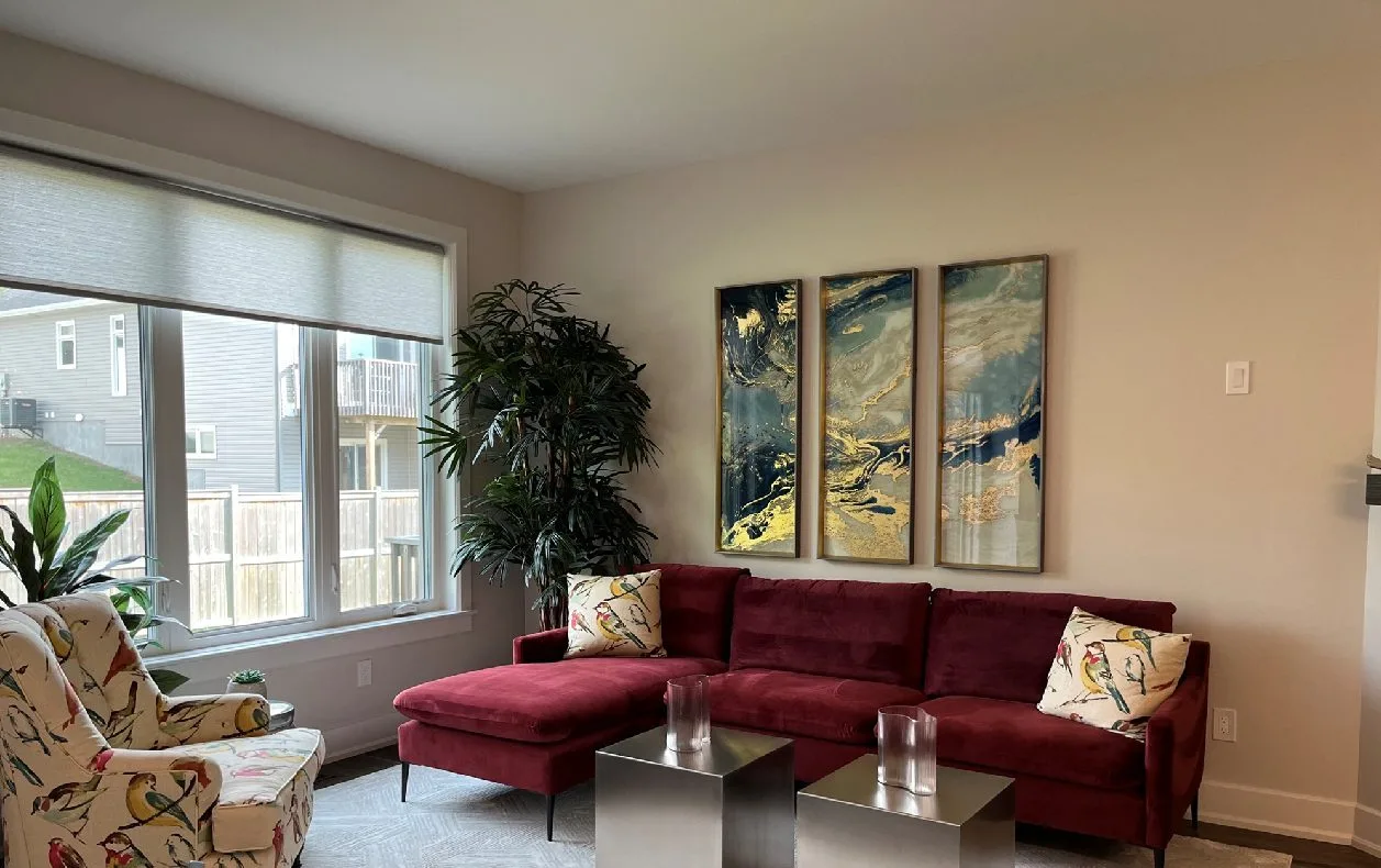 The living room in the Abbey townhome model in Tamarack Homes' Cardinal Creek Village