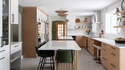 contemporary kitchen in wood and white with double islands and open shelving