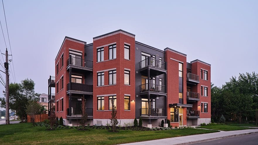 Exterior of a low-rise apartment building by RJH Architecture + Planning