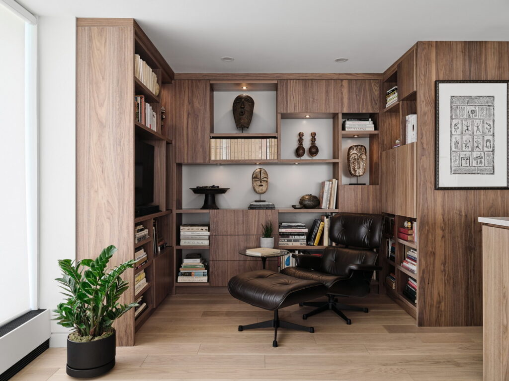 condo renovation library walnut cabinets built-in Eames chair Simmonds Architecture Crossford Construction Cedar Ridge Designs