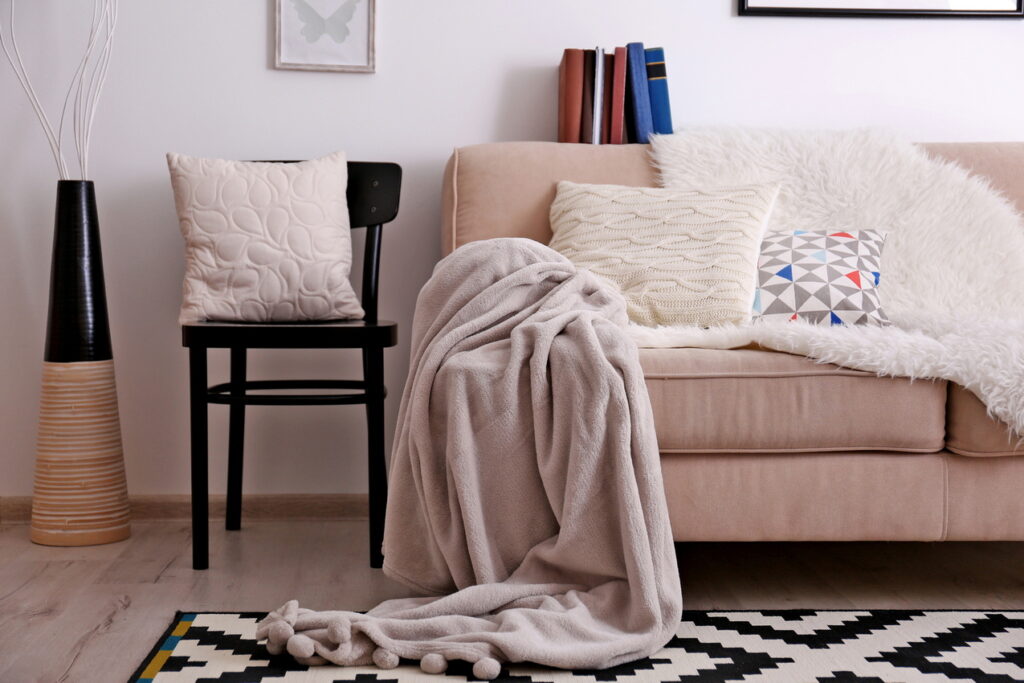 cosy for winter Beige sofa in the room interior