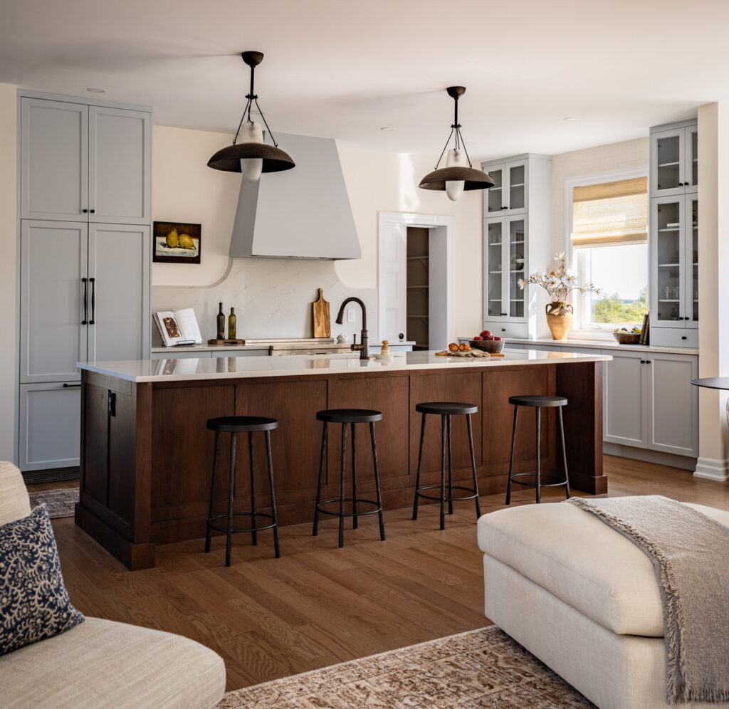 looking from the living room into the open-concept kitchen of eQ Homes’ Elliot single-family home