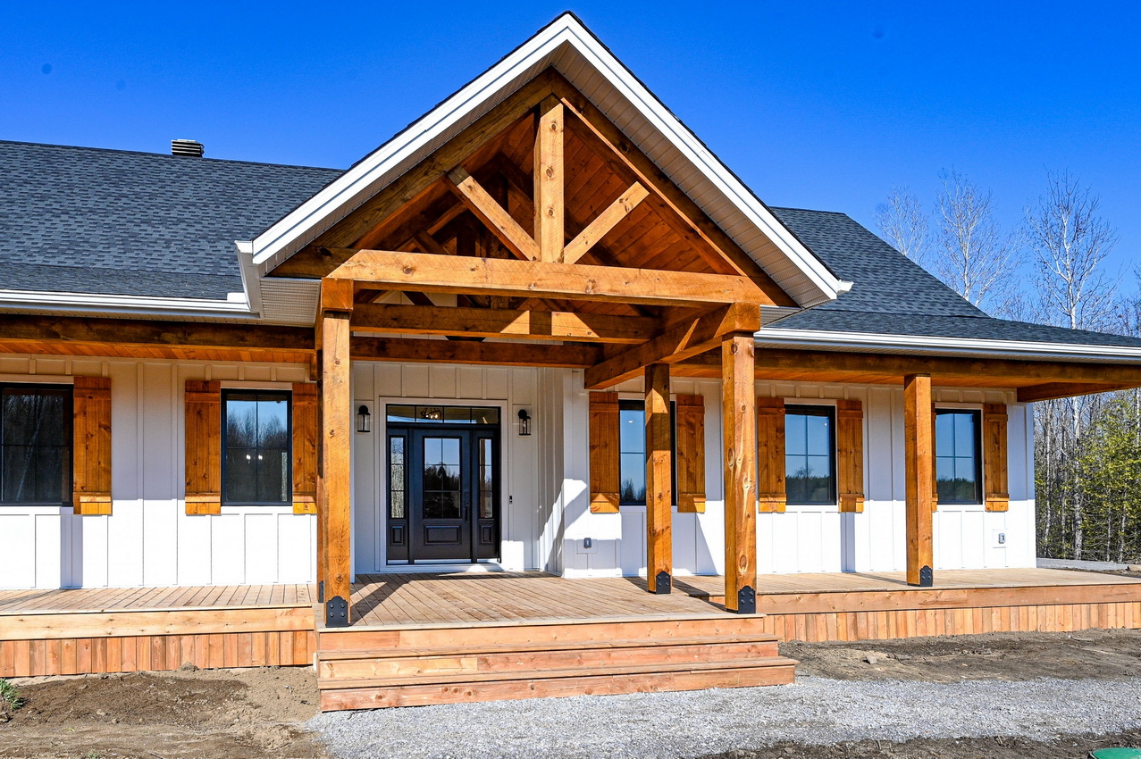 Ottawa custom homes front porch timber beam