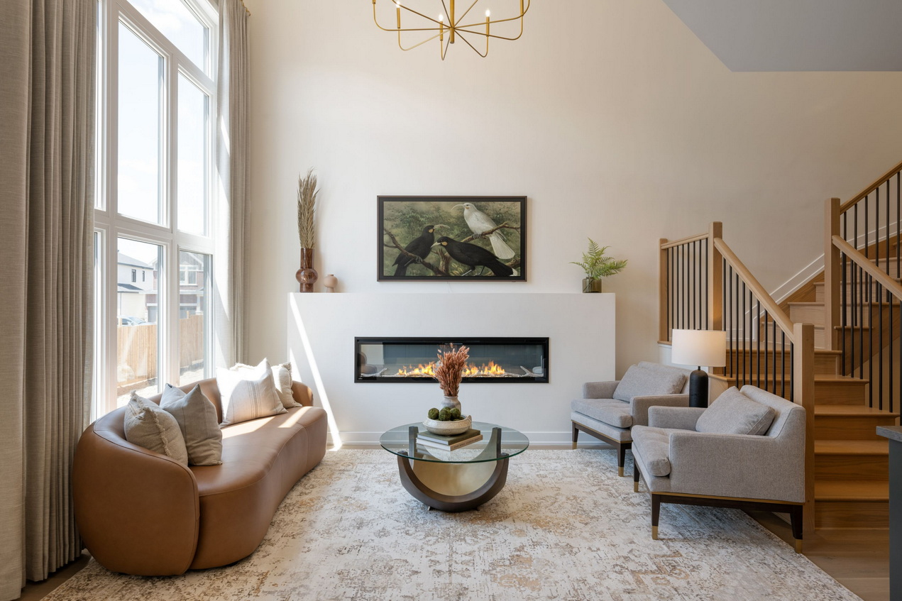 2024 Housing Design Awards claridge homes ottawa new homes wentworth living room contemporary fireplace cathedral ceiling