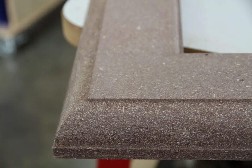 closeup of a cope-and-style corner made from composite wood