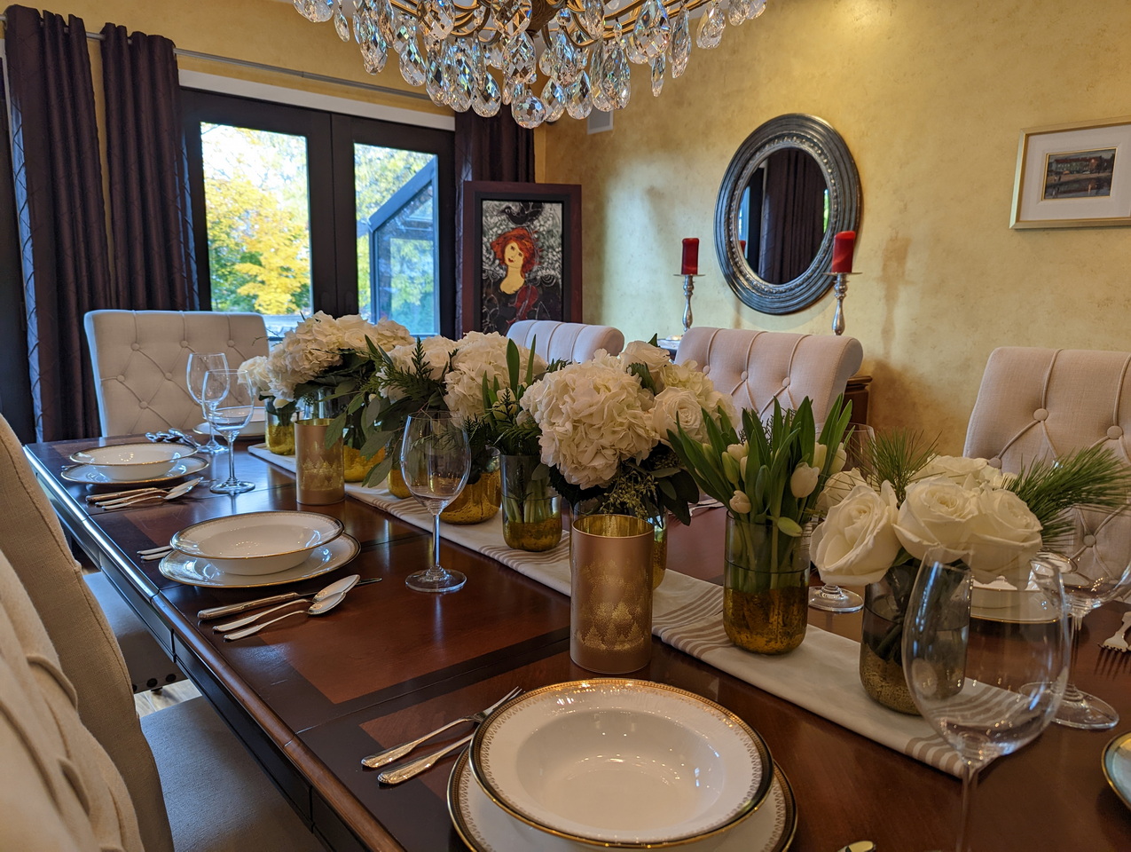 dining room table set for dinner centrepiece