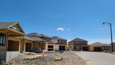 homes under construction on a street near Ottawa