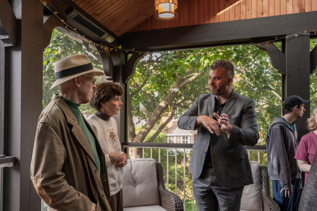 Lagois president Jacob Kirst, right, talks to visitors at the Lagois project on last year’s RenoTour. 