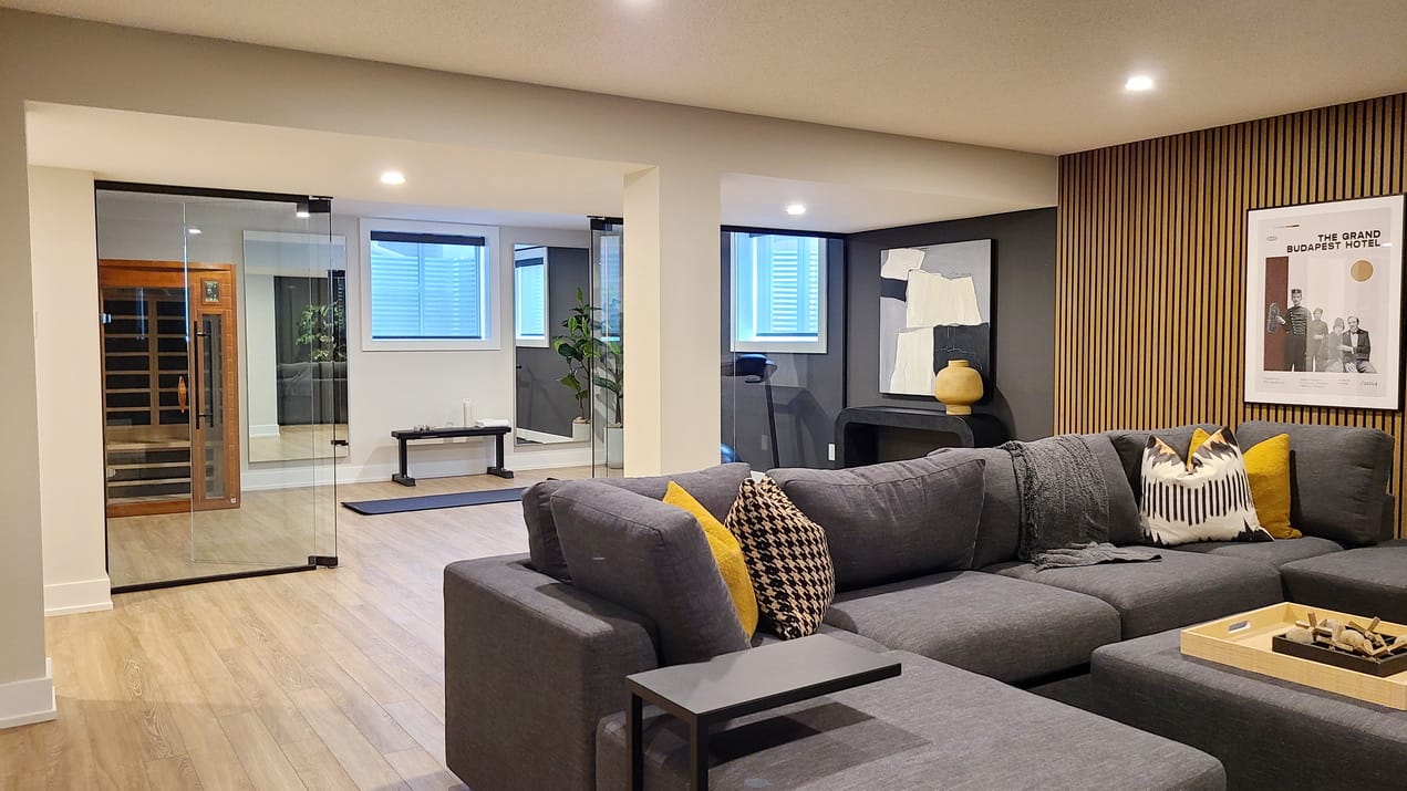 Northwoods model homes Mattamy Kanata housing essence single-family home basement rec room glassed-in gym sectional couch