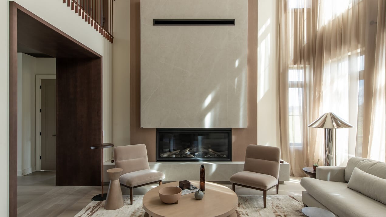two-storey contemporary living room in earth tones