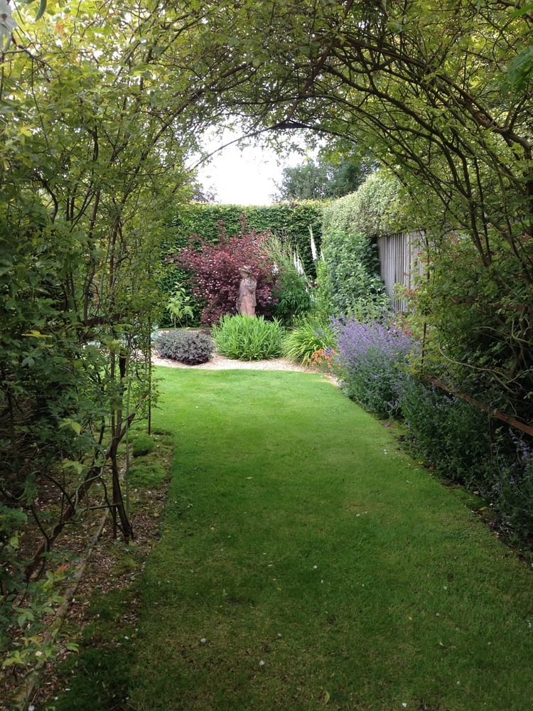 outdoor oasis living arch English garden