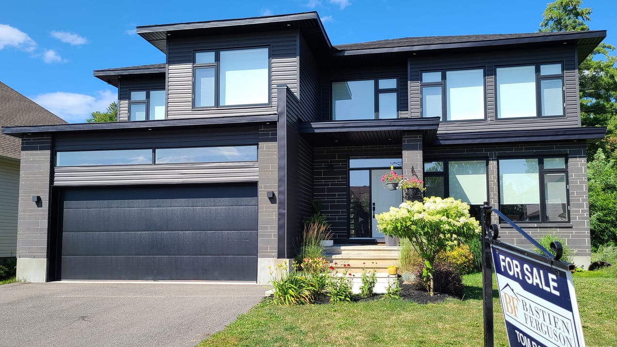 single-family home with a for sale sign in the Ottawa region July 2026 resale market