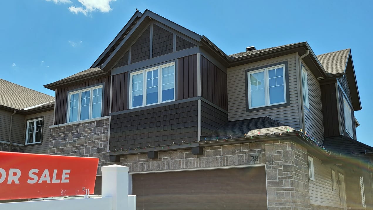 Alt: single-family home with a for sale sign in the Ottawa region may 2026 resale market