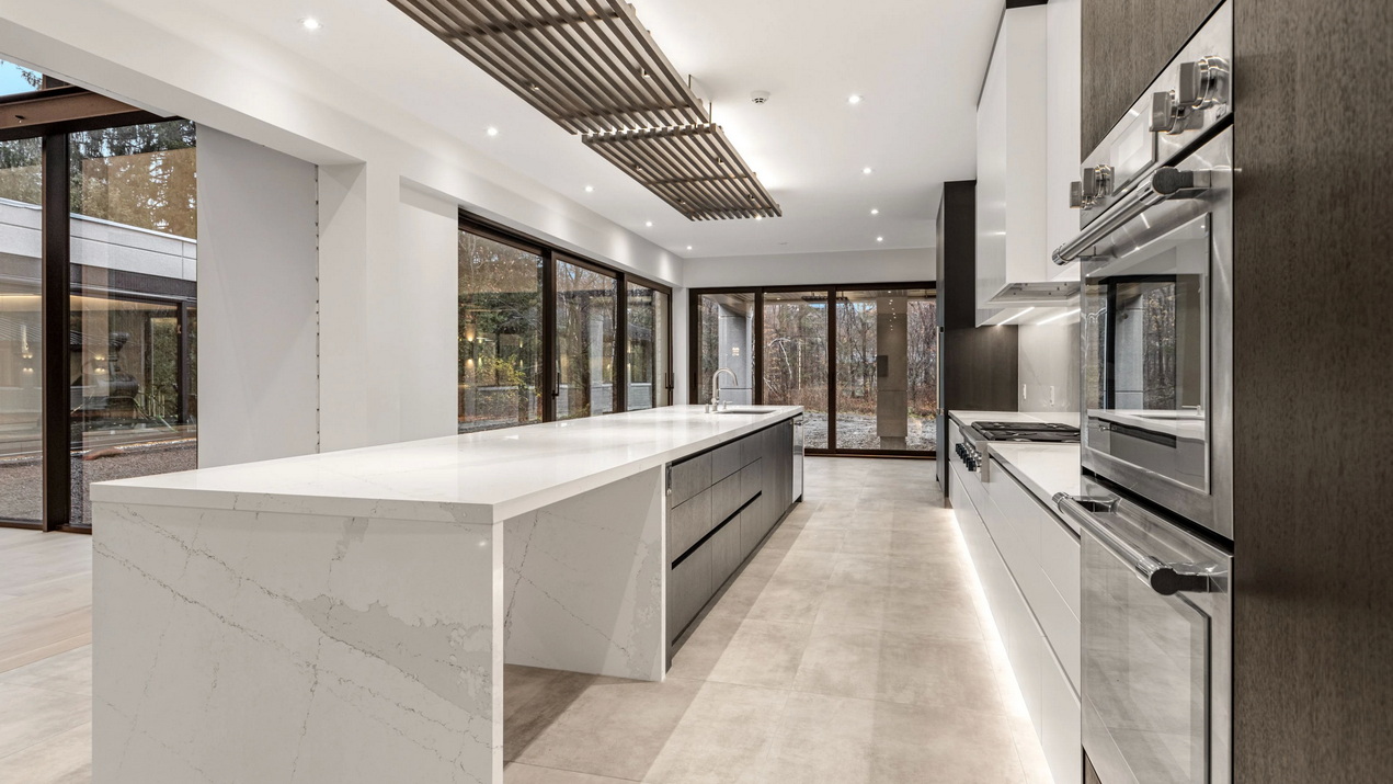 kitchen of a contemporary custom home by Amsted Design-Build