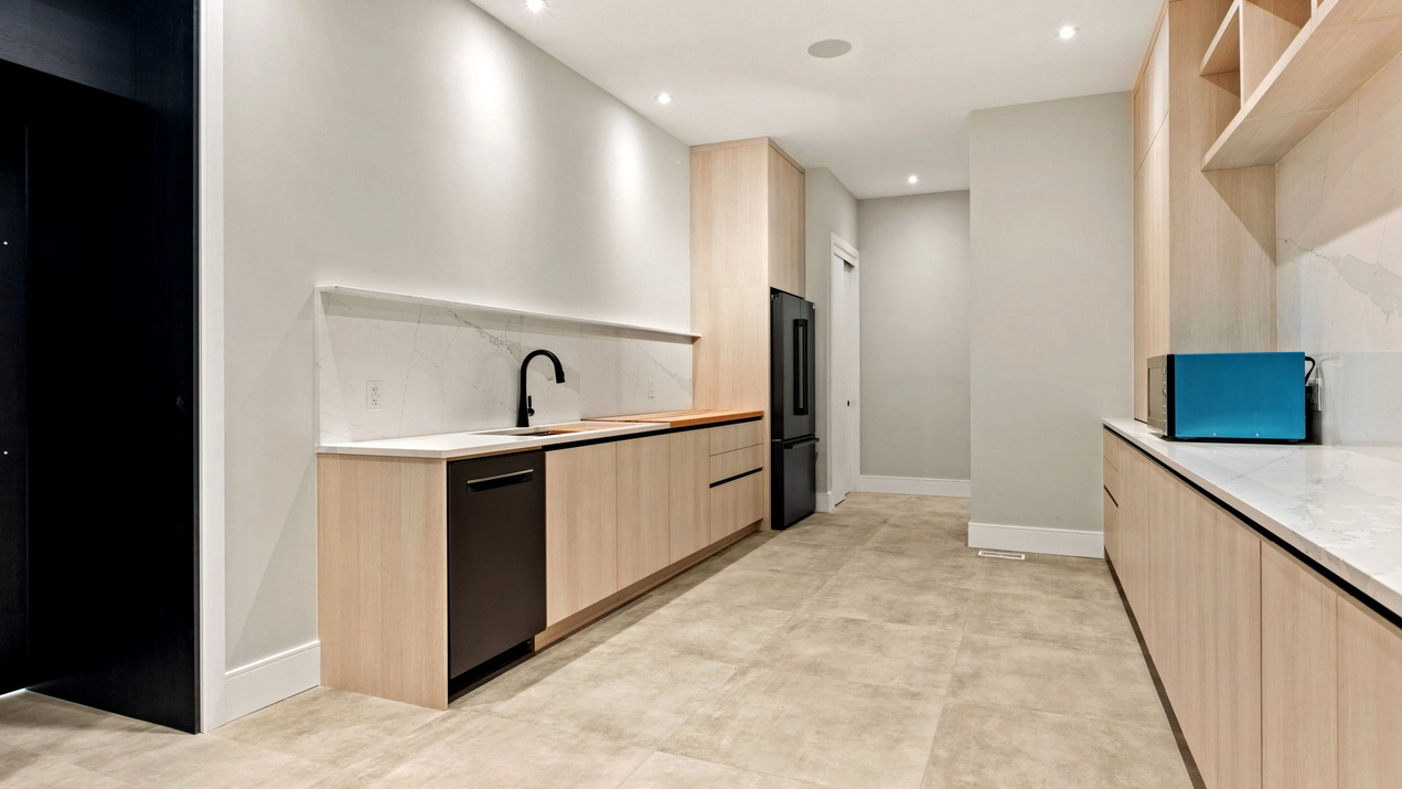 prep kitchen of a contemporary custom home by Amsted Design-Build