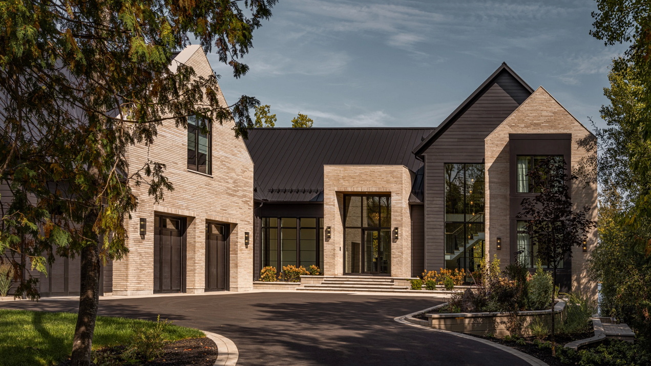 front exterior of a custom home by Ardington + Associates Design, Maple Leaf Custom Homes, and Cedar Ridge Designs and Custom Cabinetry