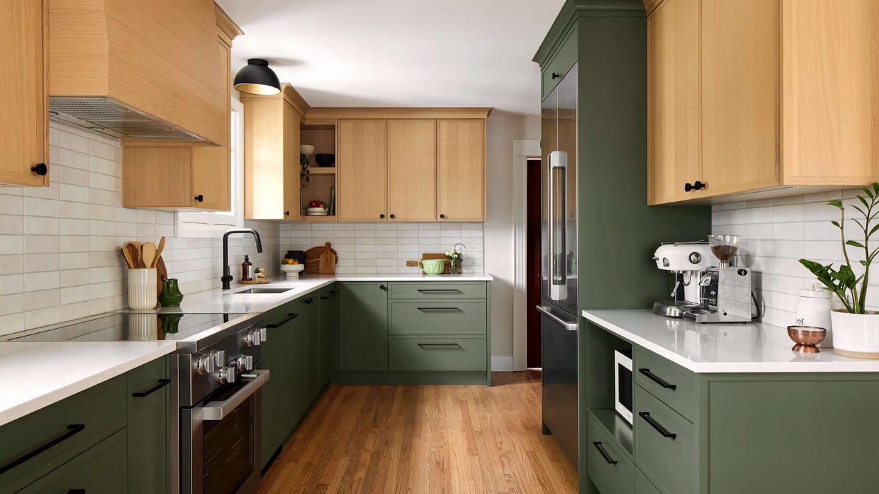 kitchen renovation in a century home with charcoal base cabinets paired with light-stained wood upper cabinets