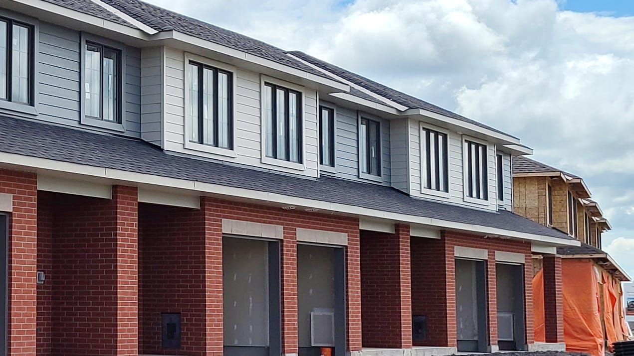 rows of townhomes under construction in Ottawa