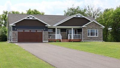 exterior of a bungalow on a rural lot