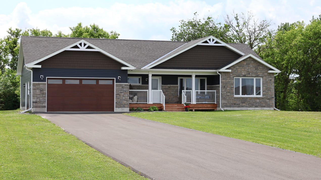exterior of a bungalow on a rural lot