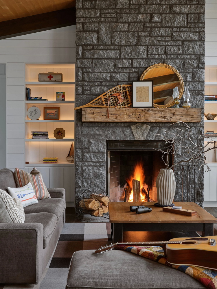 stone fireplace in a project by 2H Interior Design