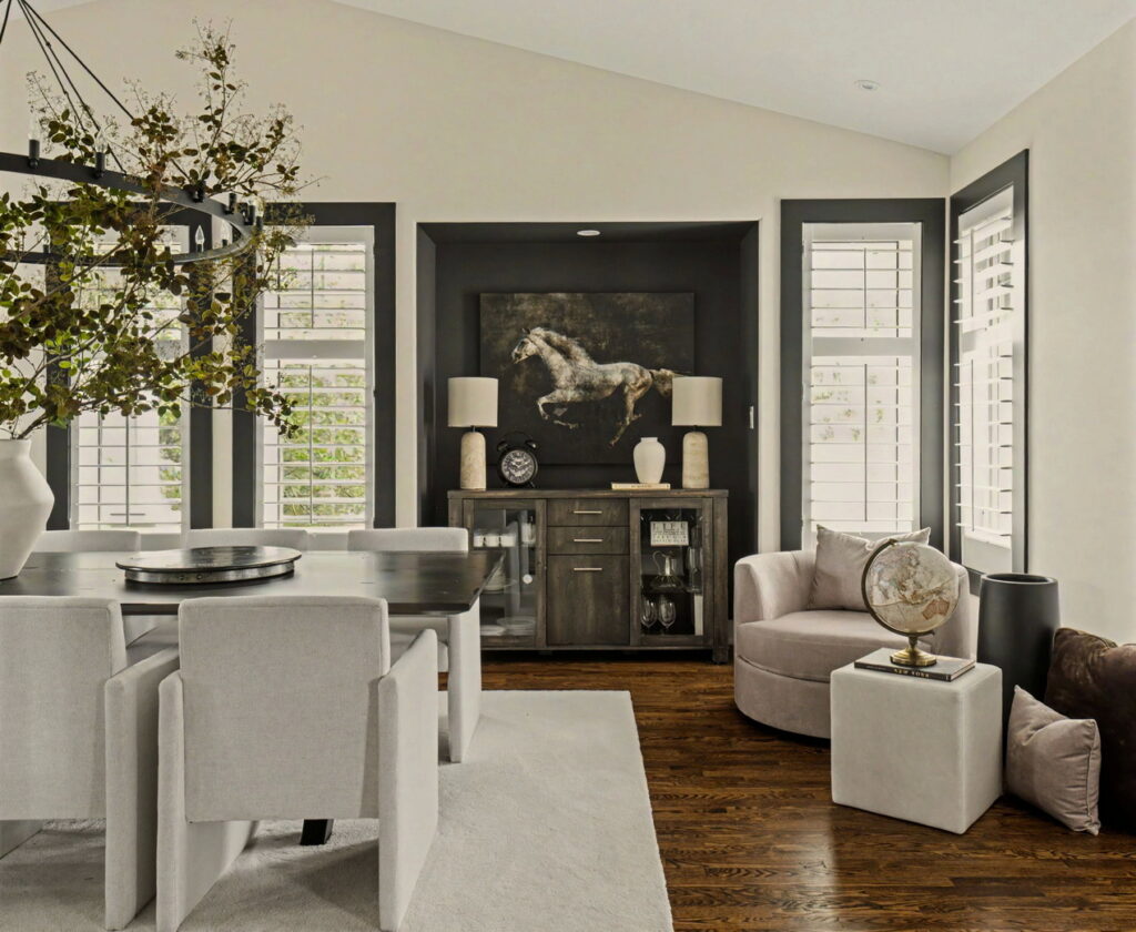 Monochromatic dining room with recessed alcove for the hutch in a project by Amsted Design-Build