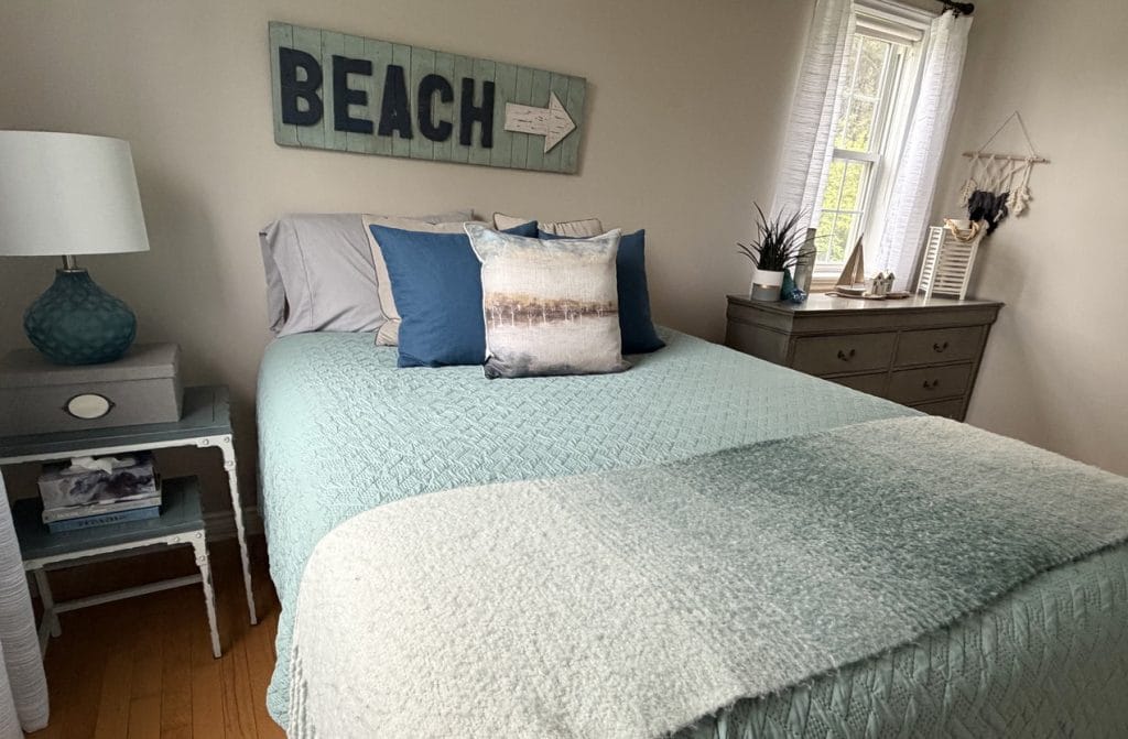 coastal or beach themed bedroom in light blue, navy blue, white and grey