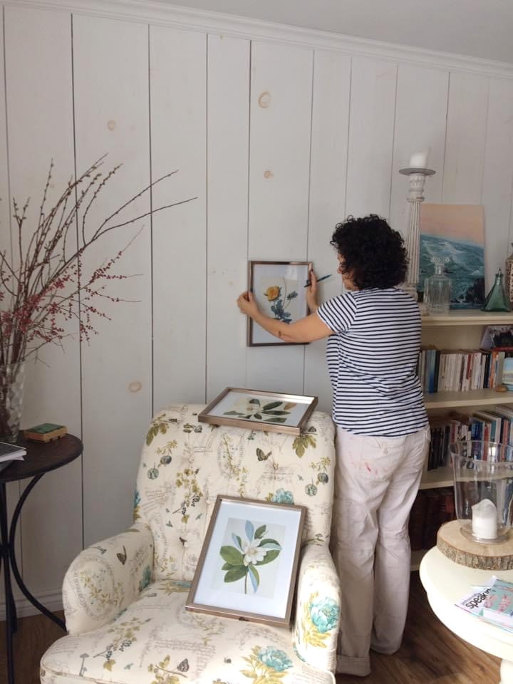 sue pitchforth decorating hanging a picture