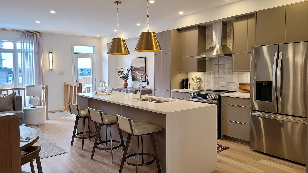 models at river’s edge claridge homes ottawa new homes townhomes woodhall open-concept kitchen riverside south